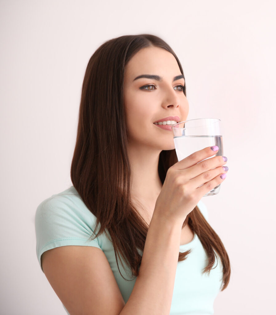 beautiful girl drinking water